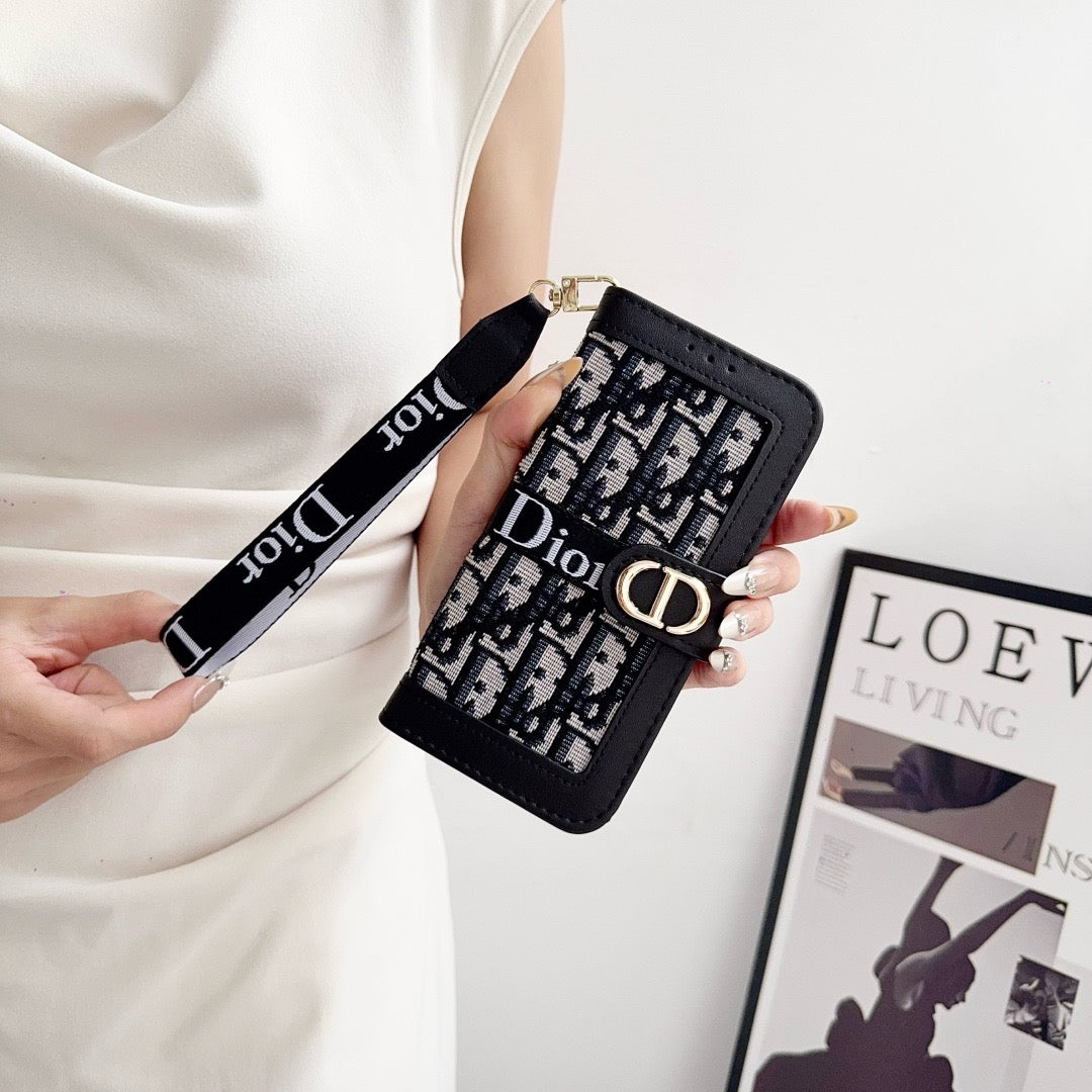 Modische iPhone-Hülle mit elegantem Muster und abnehmbarer Handschlaufe