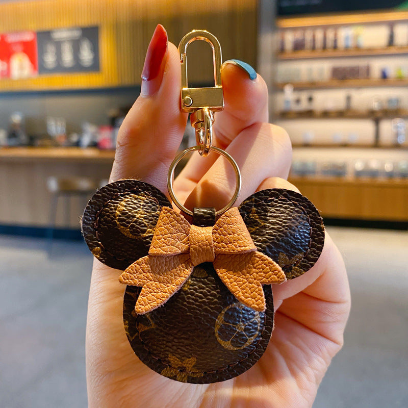 Luxury Mickey Keychain – Faux Leather & Fur Pom Charm