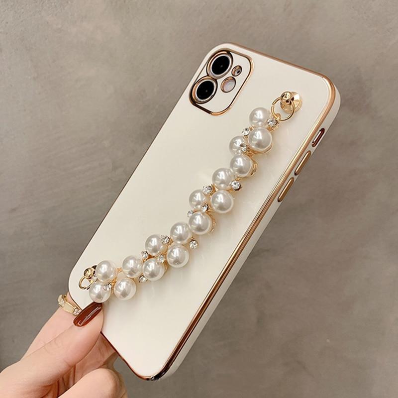 Coque et skin iPhone avec chaîne de perles brillantes