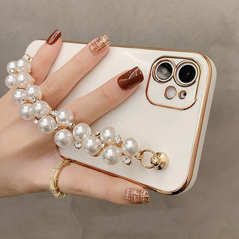 Coque et skin iPhone avec chaîne de perles brillantes
