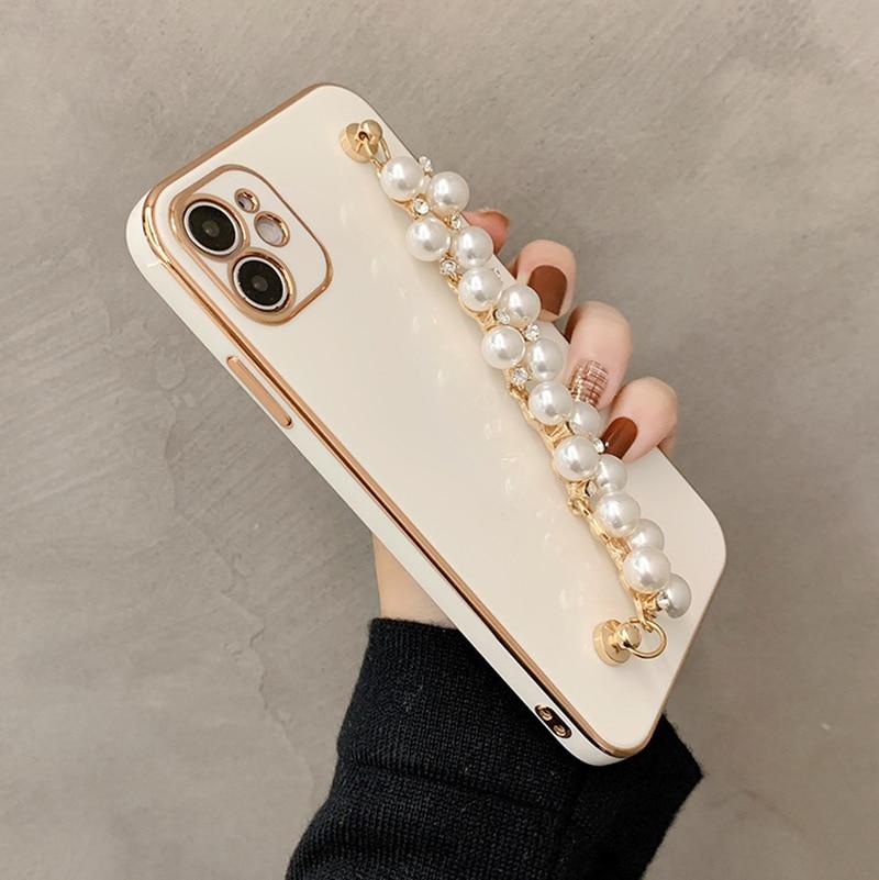 Coque et skin iPhone avec chaîne de perles brillantes